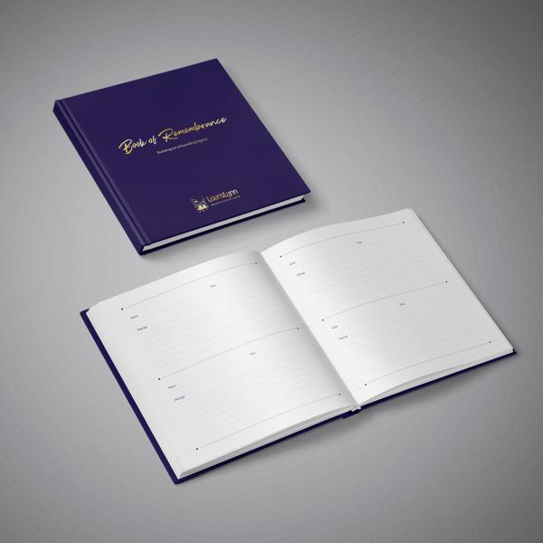 Photo of the LauraLynn Book of Remembrance. Navy book hardback book with gold foil font on front. 