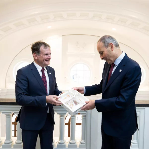 Chairperson of LauraLynn Children’s Hospice Niall McHugh (left) is pictured presenting a gift hand made in the hospice to Taoiseach Micheál Martin 