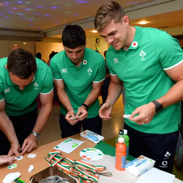 Garry Ringrose, Jimmy O'Brien and Jack Conan create art work with LauraLynn's activity coordinator, Margaret Farrell