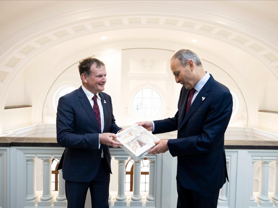 Chairperson of LauraLynn Children’s Hospice Niall McHugh (left) is pictured presenting a gift hand made in the hospice to Taoiseach Micheál Martin 