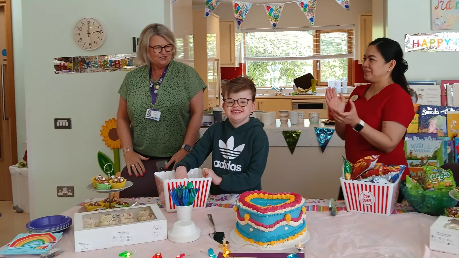 Cian cutting the LauraLynn 13th Birthday cake